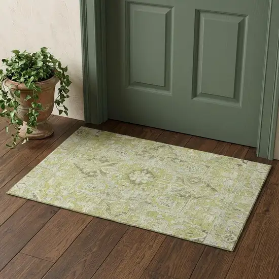 Fern Green And Ivory Oriental Washable Area Rug With UV Protection Photo 1