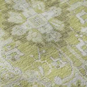 Photo of Fern Green And Ivory Oriental Washable Area Rug With UV Protection