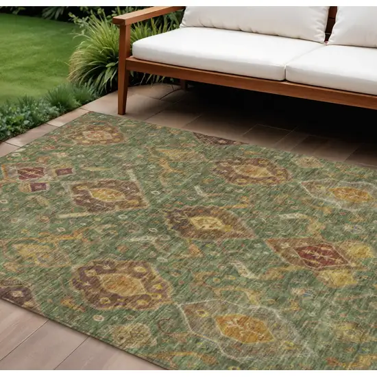 Fern Green Brown And Gold Ikat Washable Indoor Outdoor Area Rug Photo 1