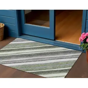 Photo of Fern Green Ivory And Gray Striped Washable Indoor Outdoor Area Rug