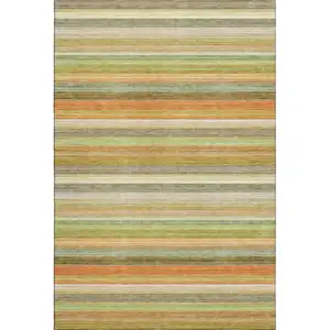 Photo of Fern Green Orange And Beige Striped Washable Area Rug With UV Protection