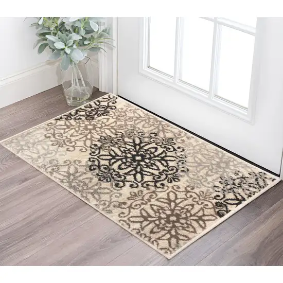 Tan Gray And Black Floral Medallion Stain Resistant Area Rug Photo 1