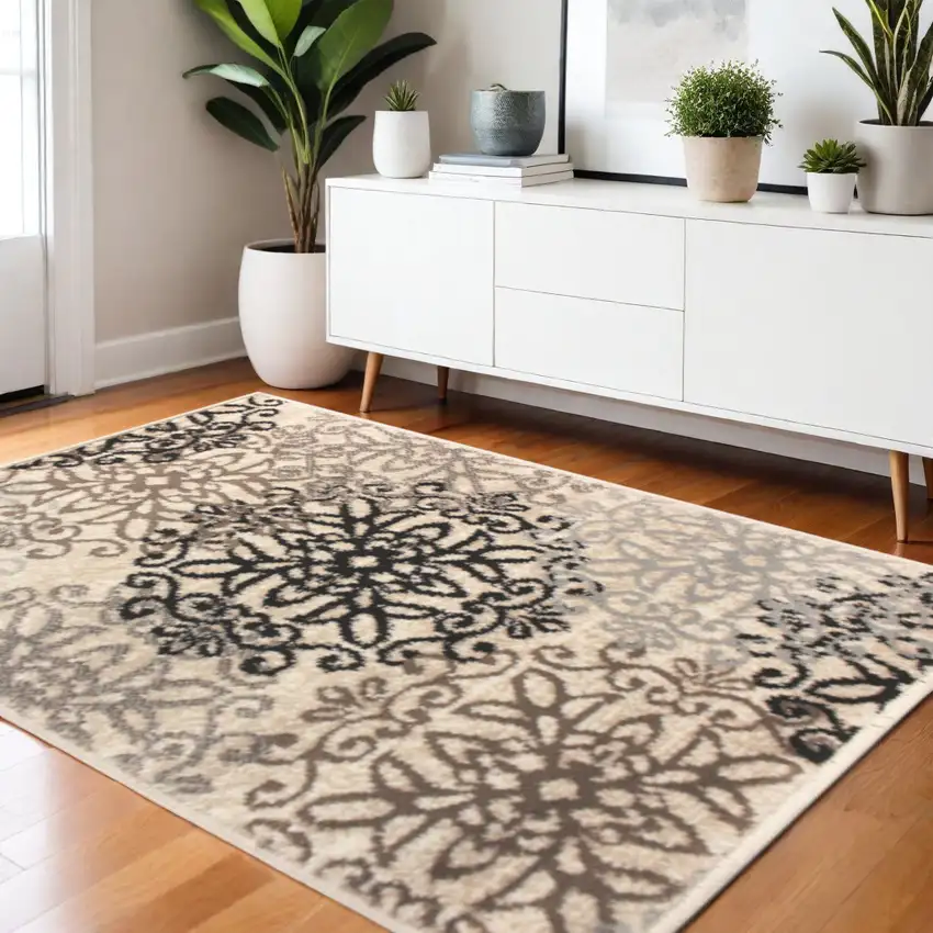 Beige Black And Brown Floral Medallion Area Rug Photo 1