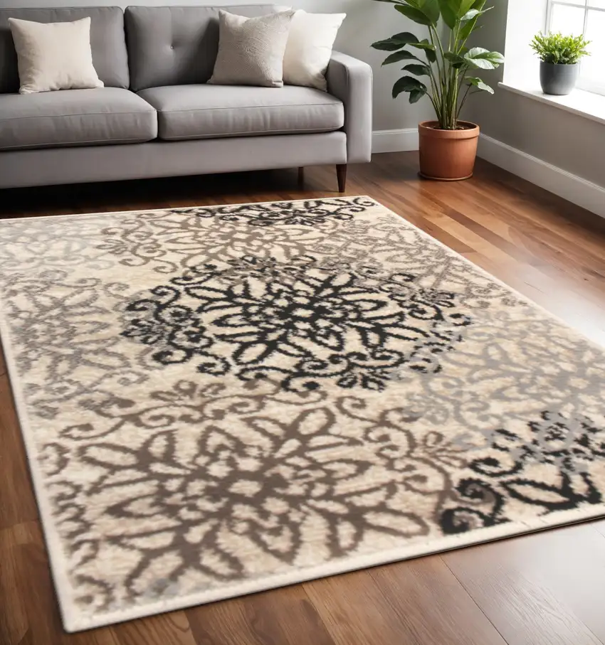 Beige Black And Brown Floral Medallion Area Rug Photo 1