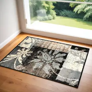 Photo of Floral Power Loom Distressed Stain Resistant Area Rug