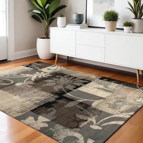 Beige Brown And Gray Floral Distressed Area Rug Photo 1