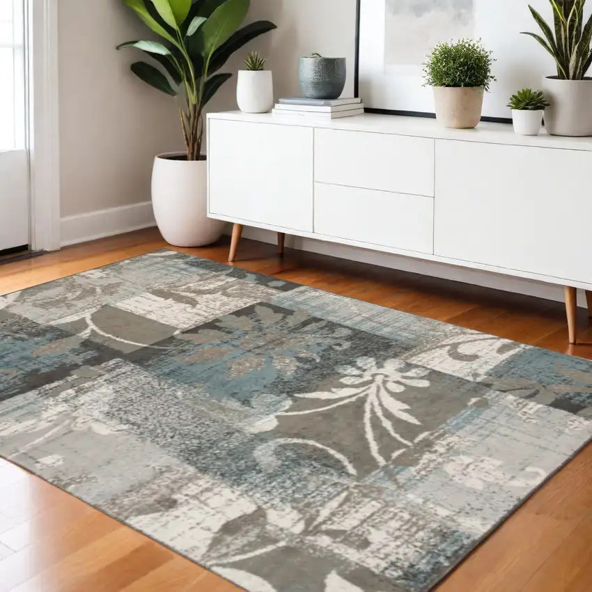 Tan And Gray Floral Distressed Area Rug Photo 1