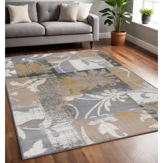 Beige And Black Floral Distressed Area Rug Photo 1