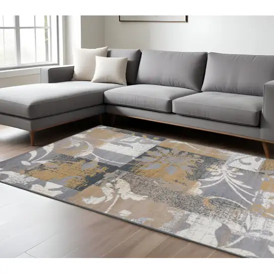 Beige And Black Floral Distressed Area Rug Photo 1