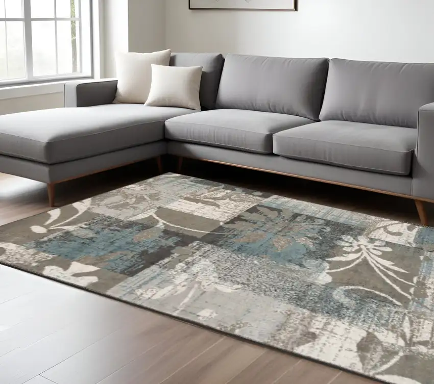 Tan And Gray Floral Distressed Area Rug Photo 1