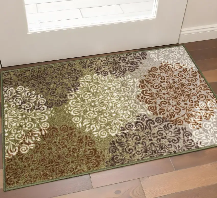 Brown Green And Ivory Floral Medallion Area Rug Photo 1