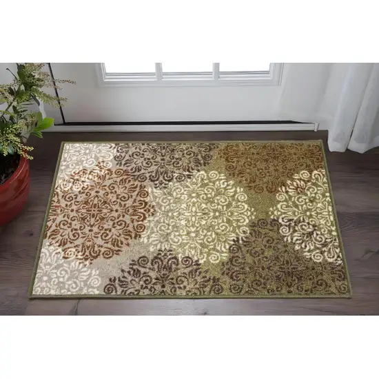 Brown Green And Ivory Floral Area Rug Photo 1