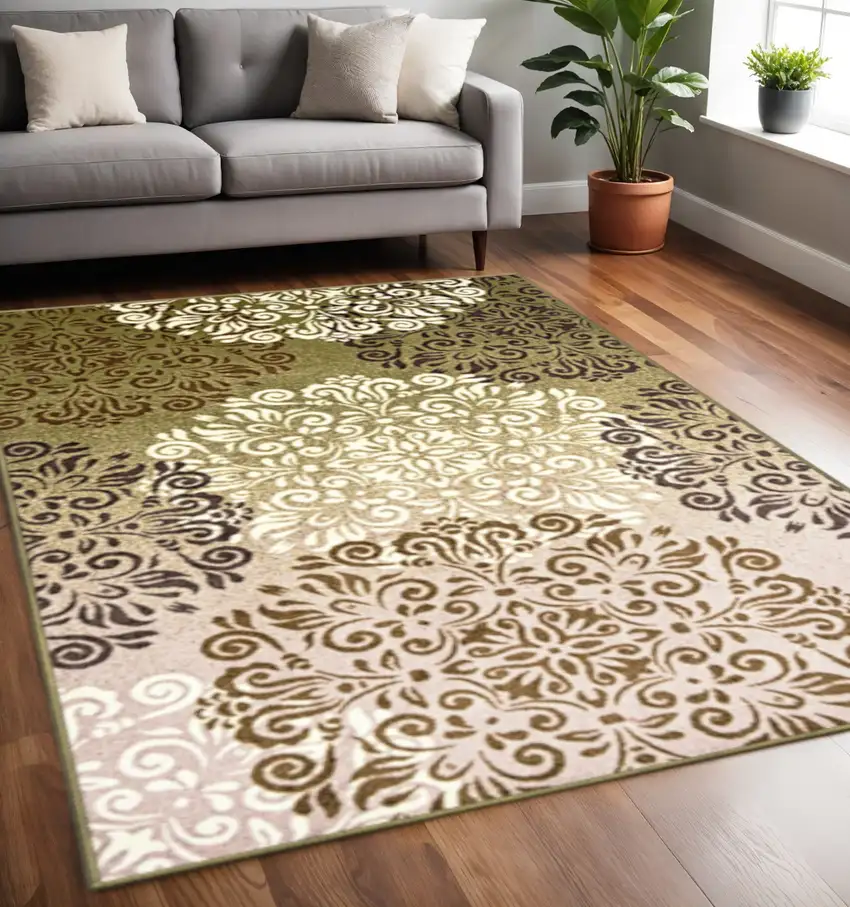 Brown Green And Ivory Floral Medallion Area Rug Photo 1