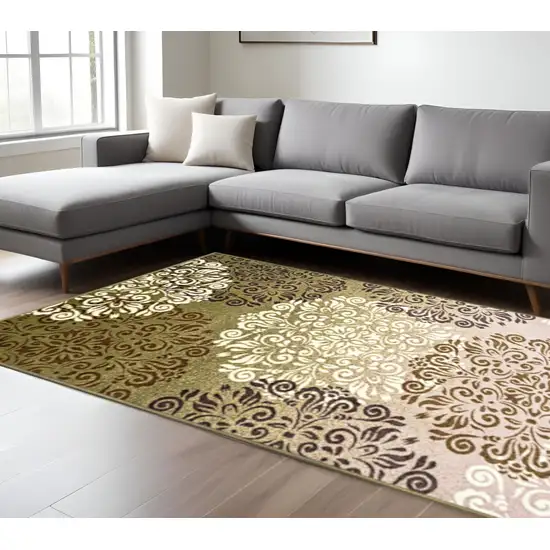 Brown Green And Ivory Floral Medallion Area Rug Photo 1