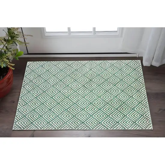 Foam Blue And Ivory Geometric Power Loom Stain Resistant Area Rug Photo 1