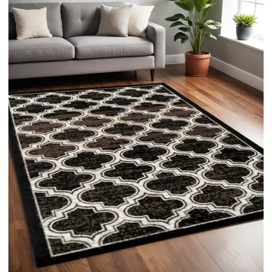 Black Brown And Ivory Geometric Area Rug Photo 1