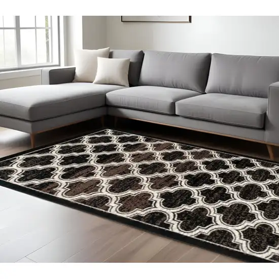 Black Brown And Ivory Geometric Area Rug Photo 1