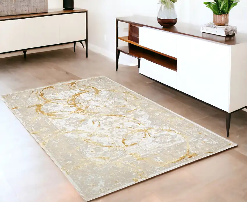 Gold Abstract Area Rug With Fringe Photo 1
