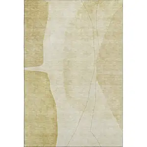 Photo of Gold And Beige Abstract Washable Area Rug With UV Protection