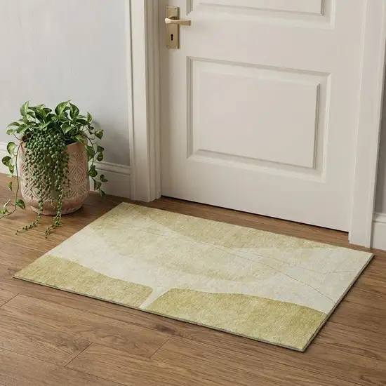 Gold And Beige Abstract Washable Area Rug With UV Protection Photo 1