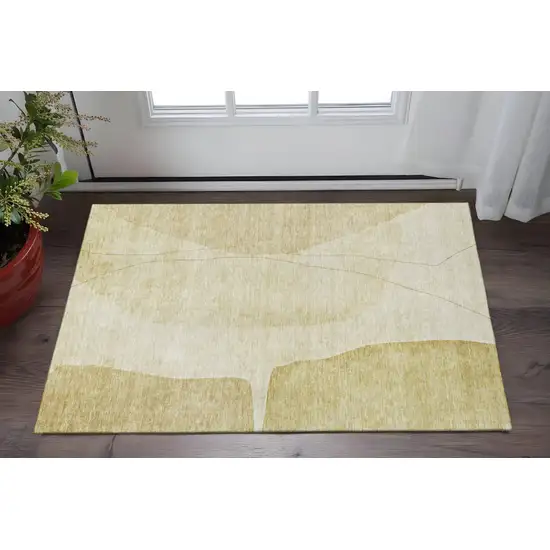 Gold And Beige Abstract Washable Area Rug With UV Protection Photo 2