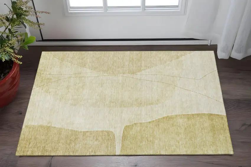 Gold And Beige Abstract Washable Area Rug With UV Protection Photo 2