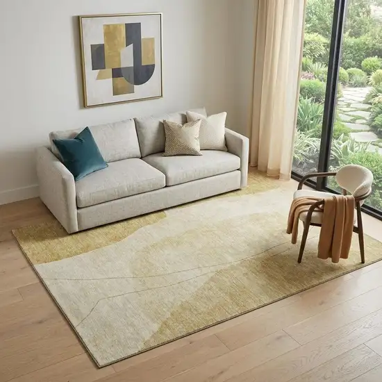 Gold And Beige Abstract Washable Area Rug With UV Protection Photo 1
