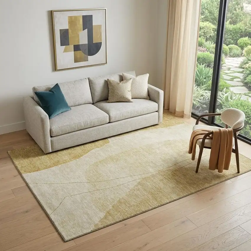 Gold And Beige Abstract Washable Area Rug With UV Protection Photo 1