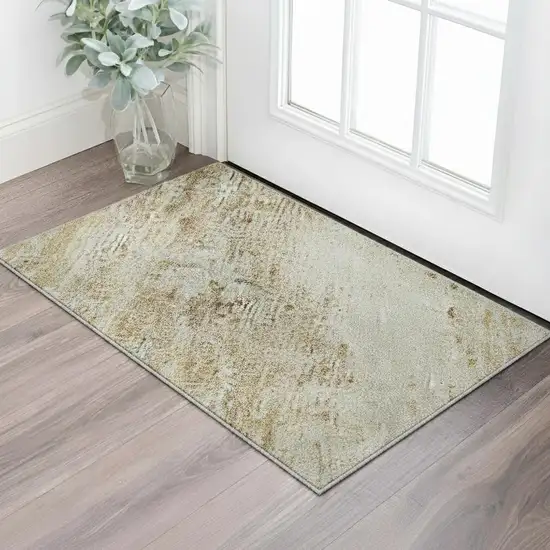 Gold And Beige Abstract Washable Area Rug With UV Protection Photo 2