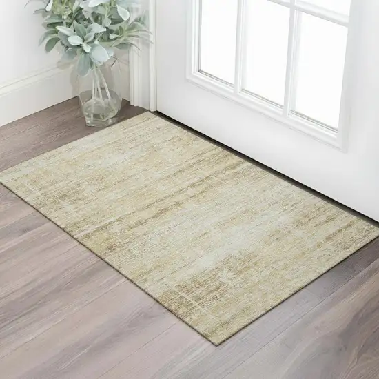 Gold And Beige Abstract Washable Area Rug With UV Protection Photo 1