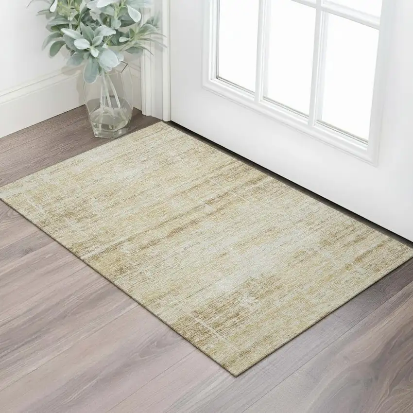 Gold And Beige Abstract Washable Area Rug With UV Protection Photo 1