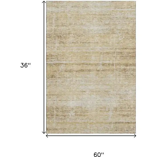 Gold And Beige Abstract Washable Area Rug With UV Protection Photo 3