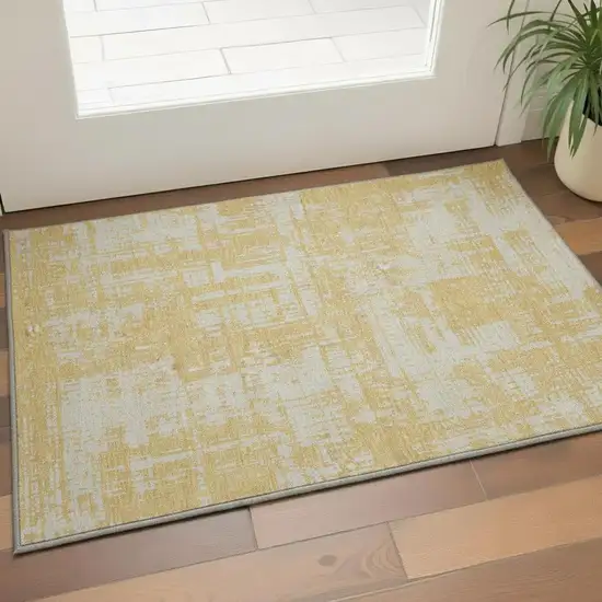 Gold And Beige Abstract Washable Area Rug With UV Protection Photo 2