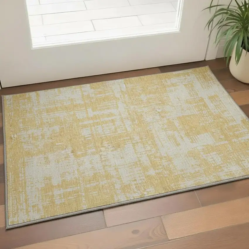 Gold And Beige Abstract Washable Area Rug With UV Protection Photo 2