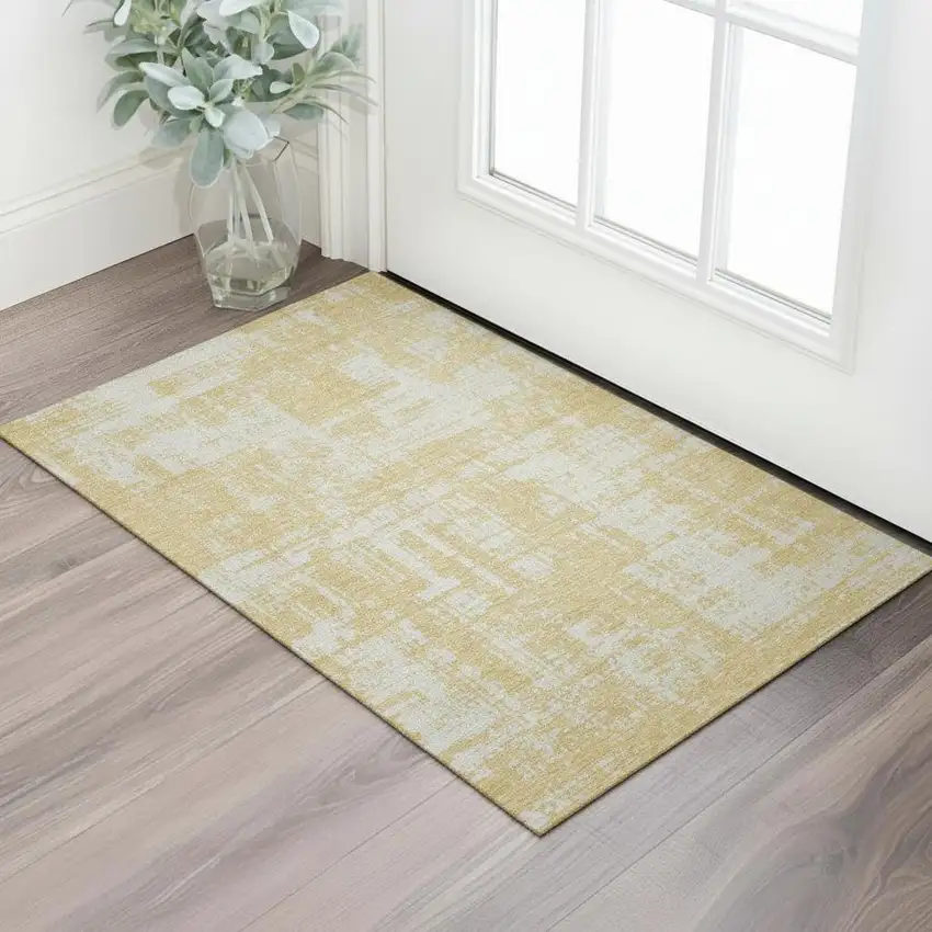 Gold And Beige Abstract Washable Area Rug With UV Protection Photo 1