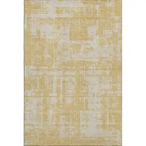 Photo of Gold And Beige Abstract Washable Area Rug With UV Protection