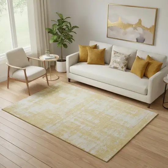 Gold And Beige Abstract Washable Area Rug With UV Protection Photo 1