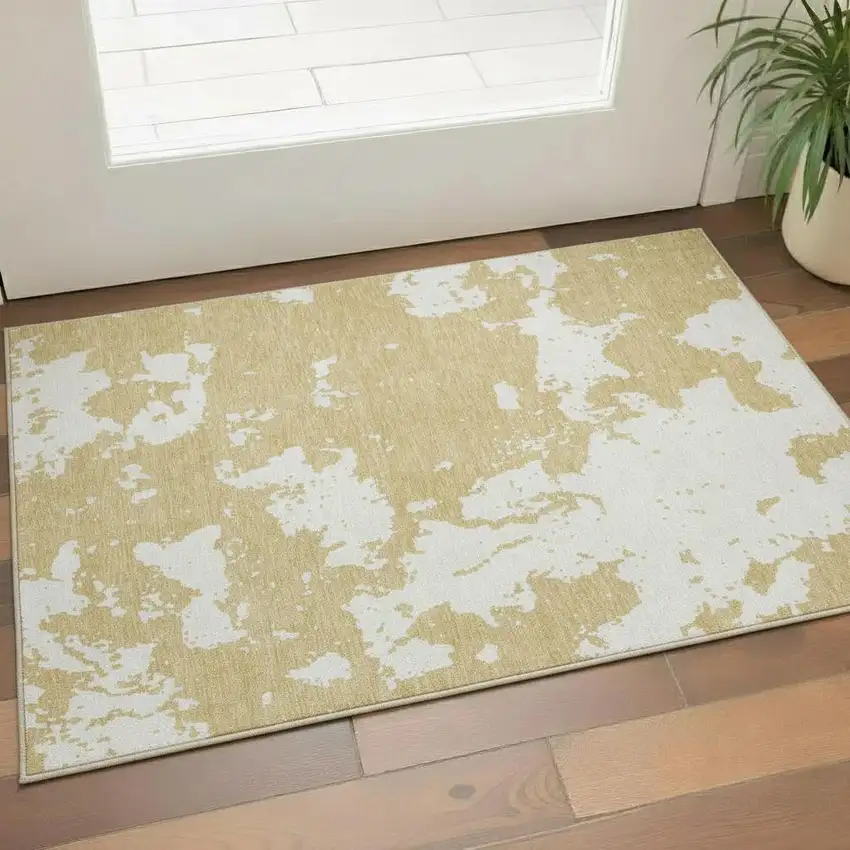 Gold And Beige Abstract Washable Area Rug With UV Protection Photo 1