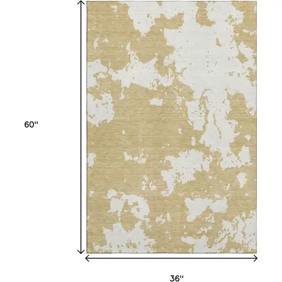 Gold And Beige Abstract Washable Area Rug With UV Protection Photo 3