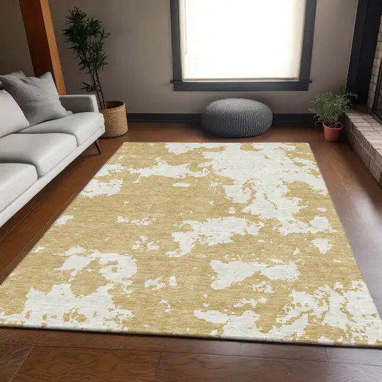 Gold And Beige Abstract Washable Area Rug With UV Protection Photo 6