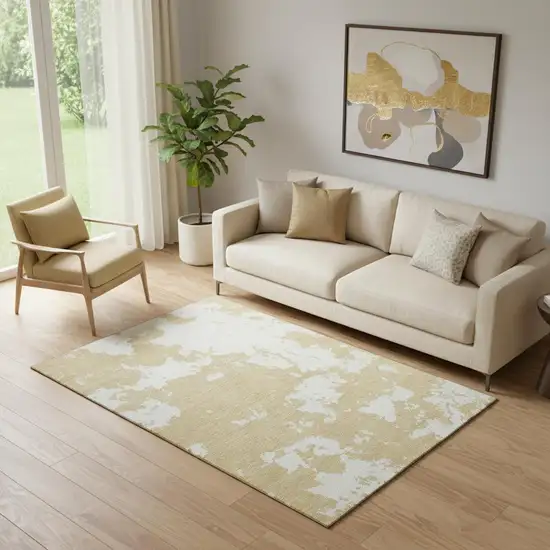 Gold And Beige Abstract Washable Area Rug With UV Protection Photo 1