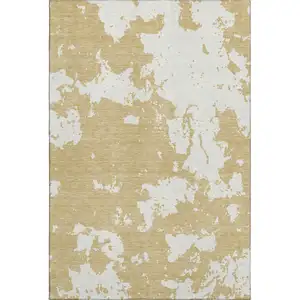Photo of Gold And Beige Abstract Washable Area Rug With UV Protection