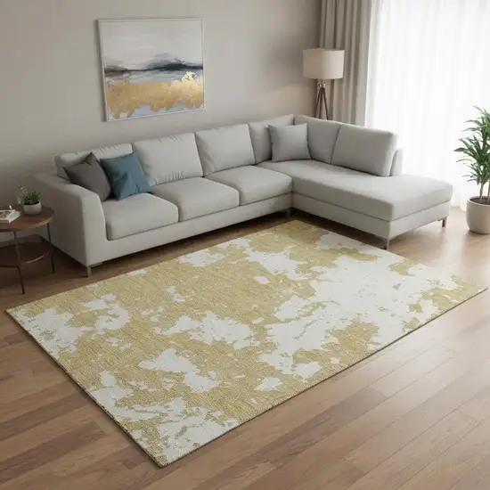 Gold And Beige Abstract Washable Area Rug With UV Protection Photo 2