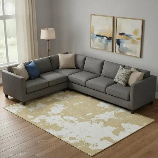 Gold And Beige Abstract Washable Area Rug With UV Protection Photo 1