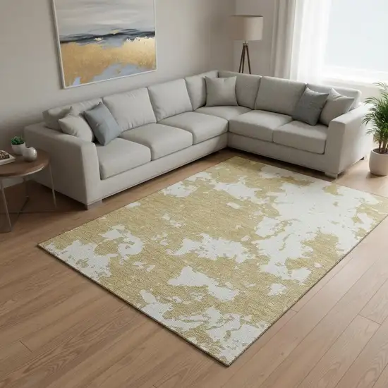 Gold And Beige Abstract Washable Area Rug With UV Protection Photo 2