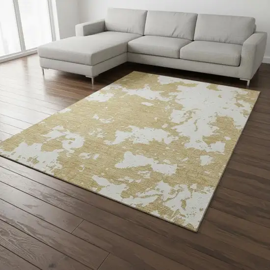 Gold And Beige Abstract Washable Area Rug With UV Protection Photo 2