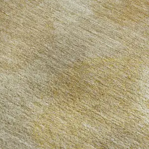 Photo of Gold And Beige Abstract Washable Area Rug With UV Protection