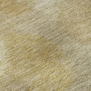 Photo of Gold And Beige Abstract Washable Area Rug With UV Protection