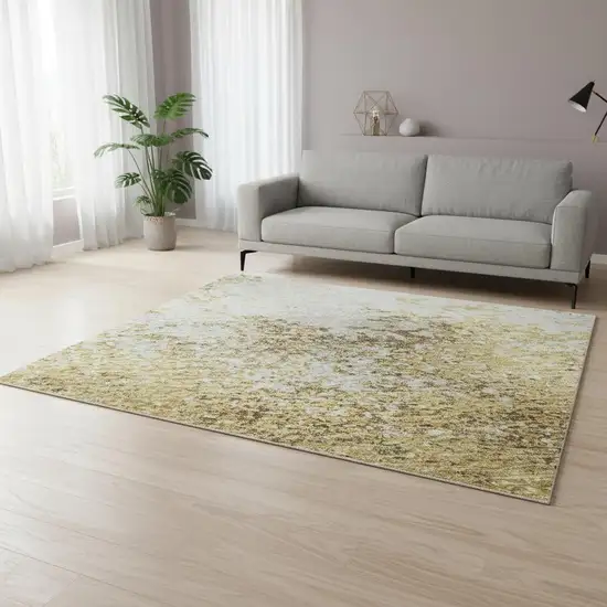 Gold And Beige Abstract Washable Area Rug With UV Protection Photo 2