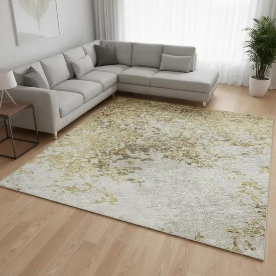 Gold And Beige Abstract Washable Area Rug With UV Protection Photo 2